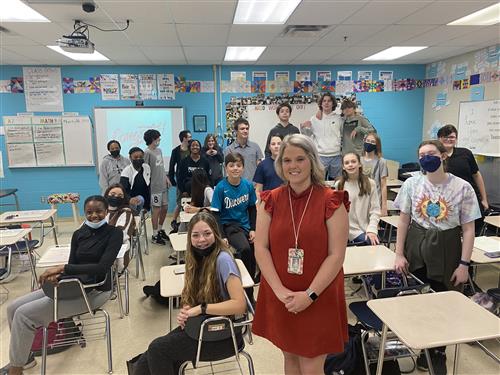 Kelsey Cooper in front of class at Discovery Middle